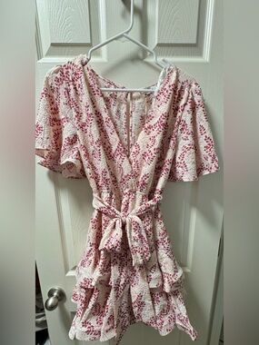 the clothing company Pink and Cream Floral Wrap Dress